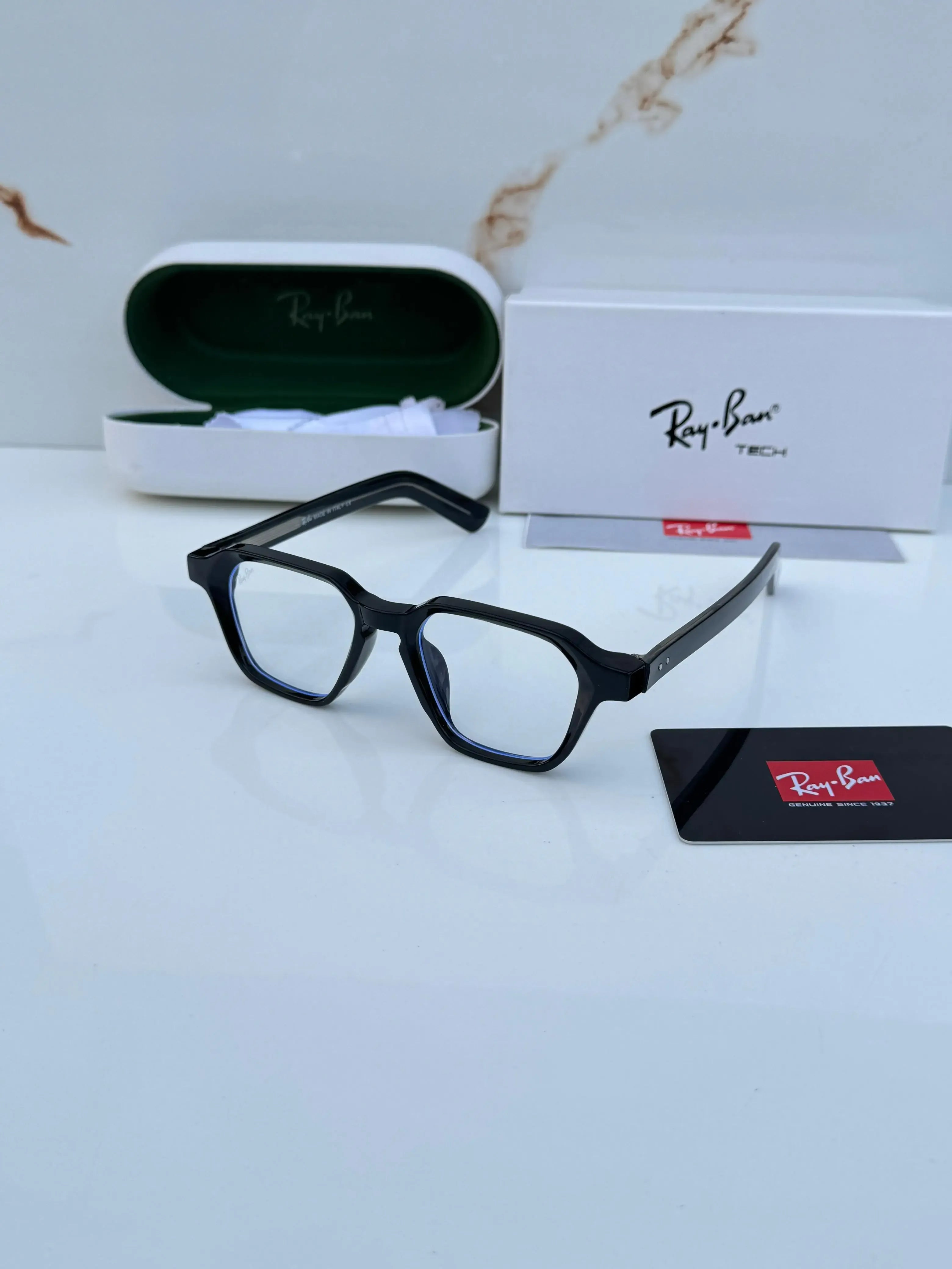 Ray-Ban RB1115 Black Plano - Flat lay with Ray-Ban Tech box and green case