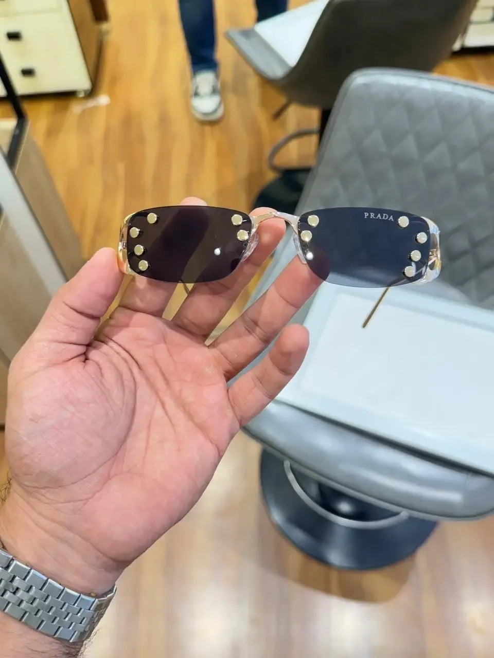 Prada Gold Black Rimless Sunglasses - Alternate Front View