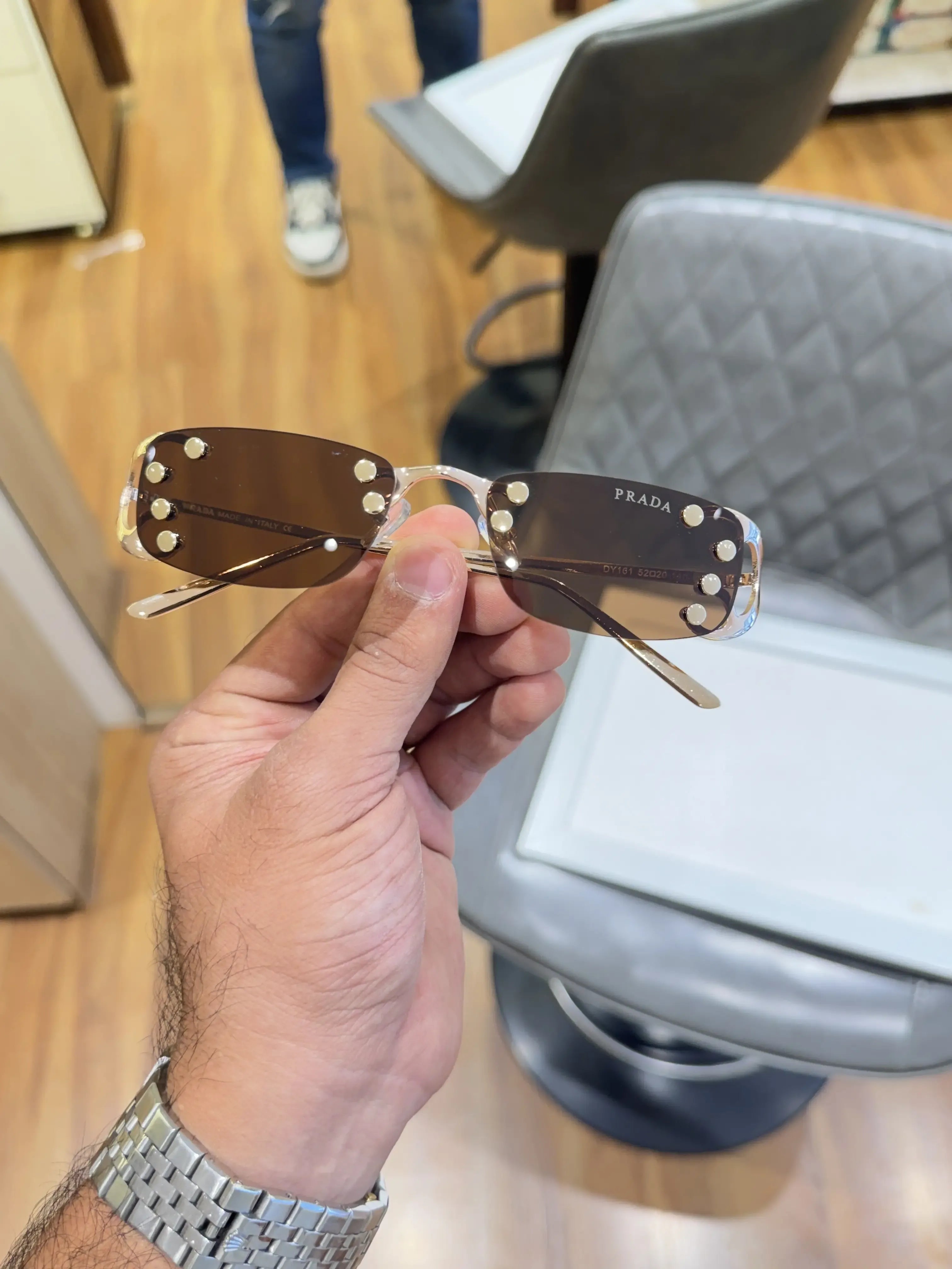 Prada Luxe Rimless Sunglasses Gold Brown - Alternate Front View