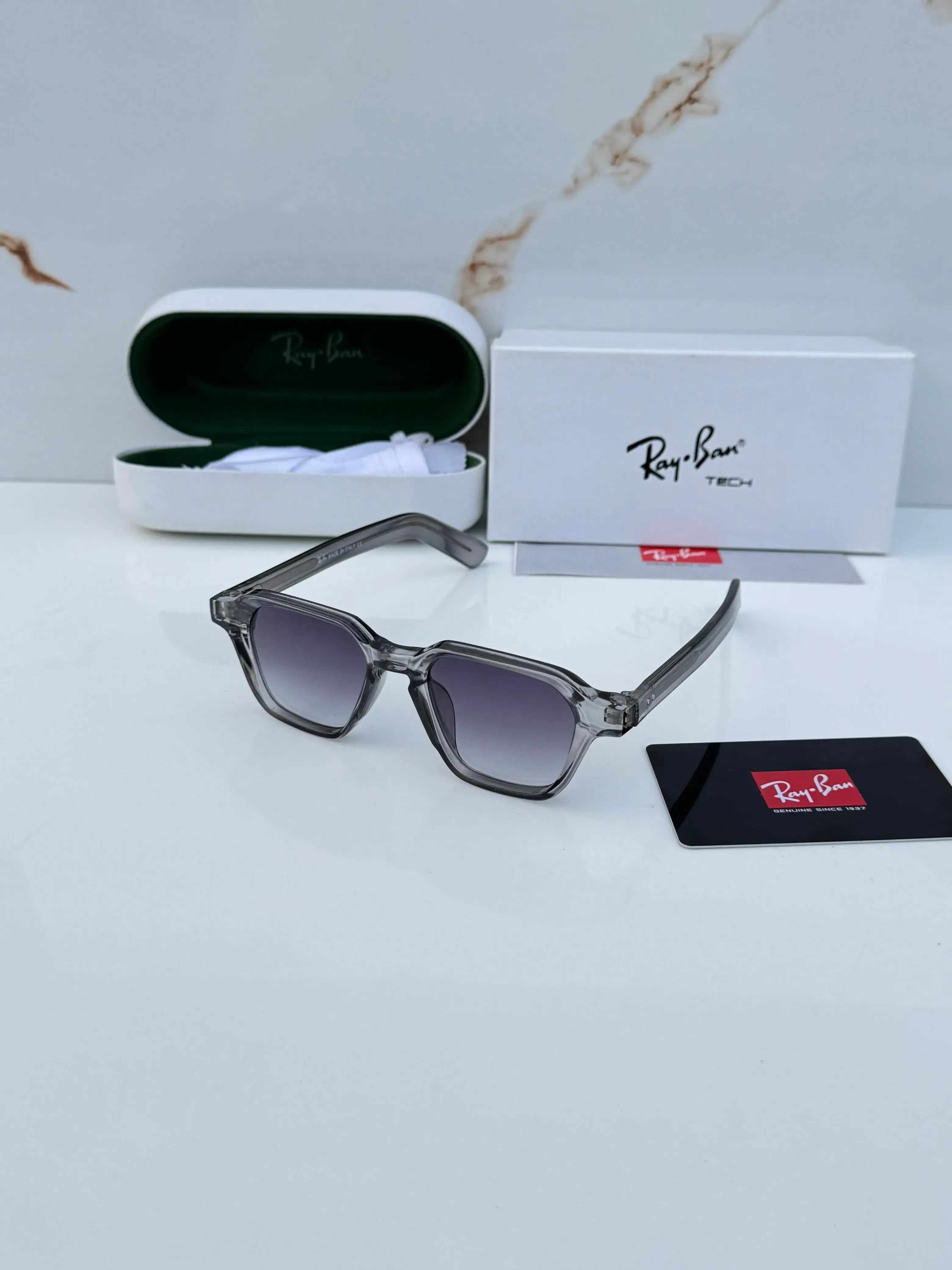 Ray-Ban RB1115 Grey Shaded - Flat lay with Ray-Ban Tech box and green case