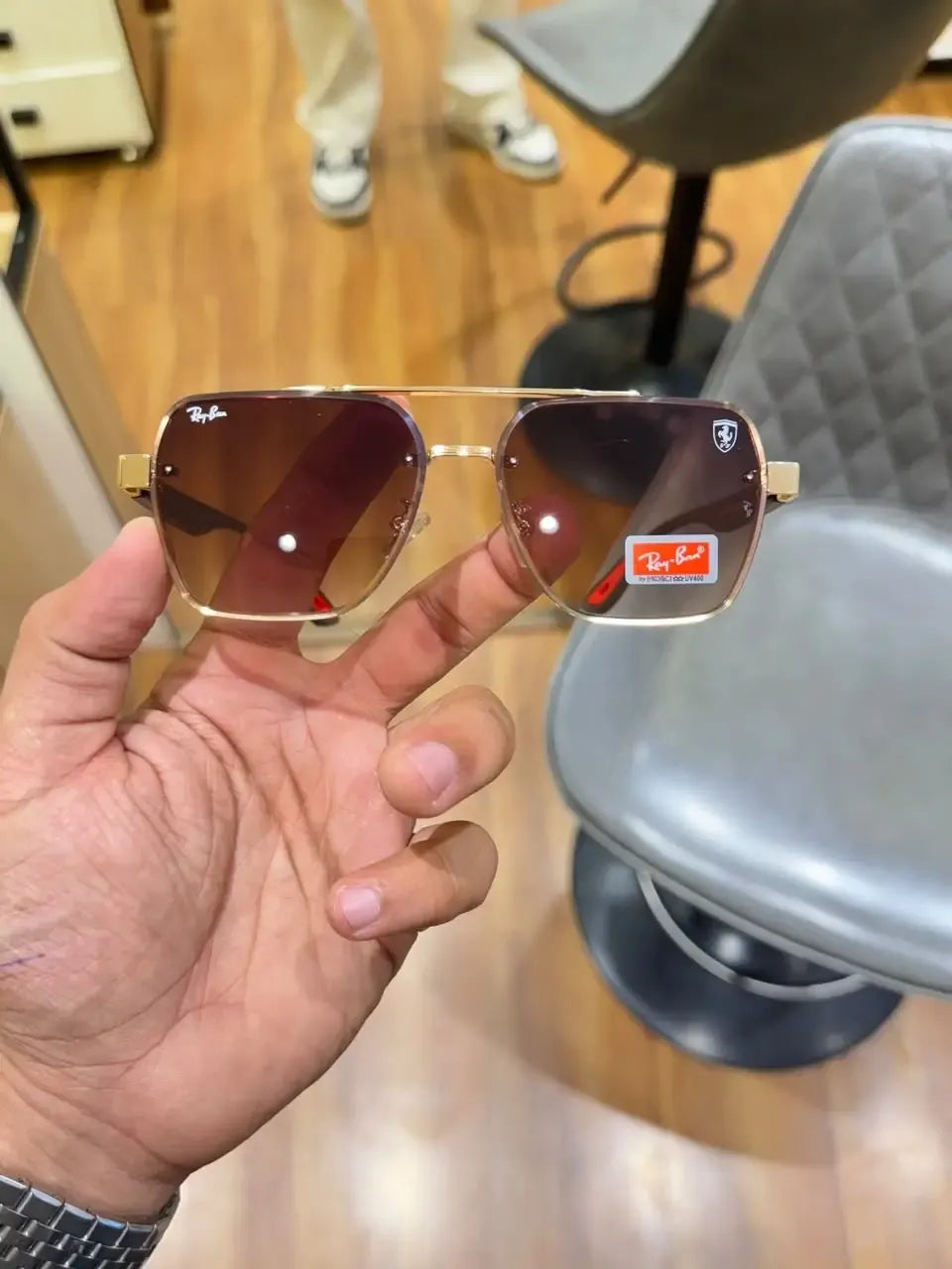 Ray-Ban x Ferrari RB4406M Gold Brown - Front face-on view with Ferrari shield logo