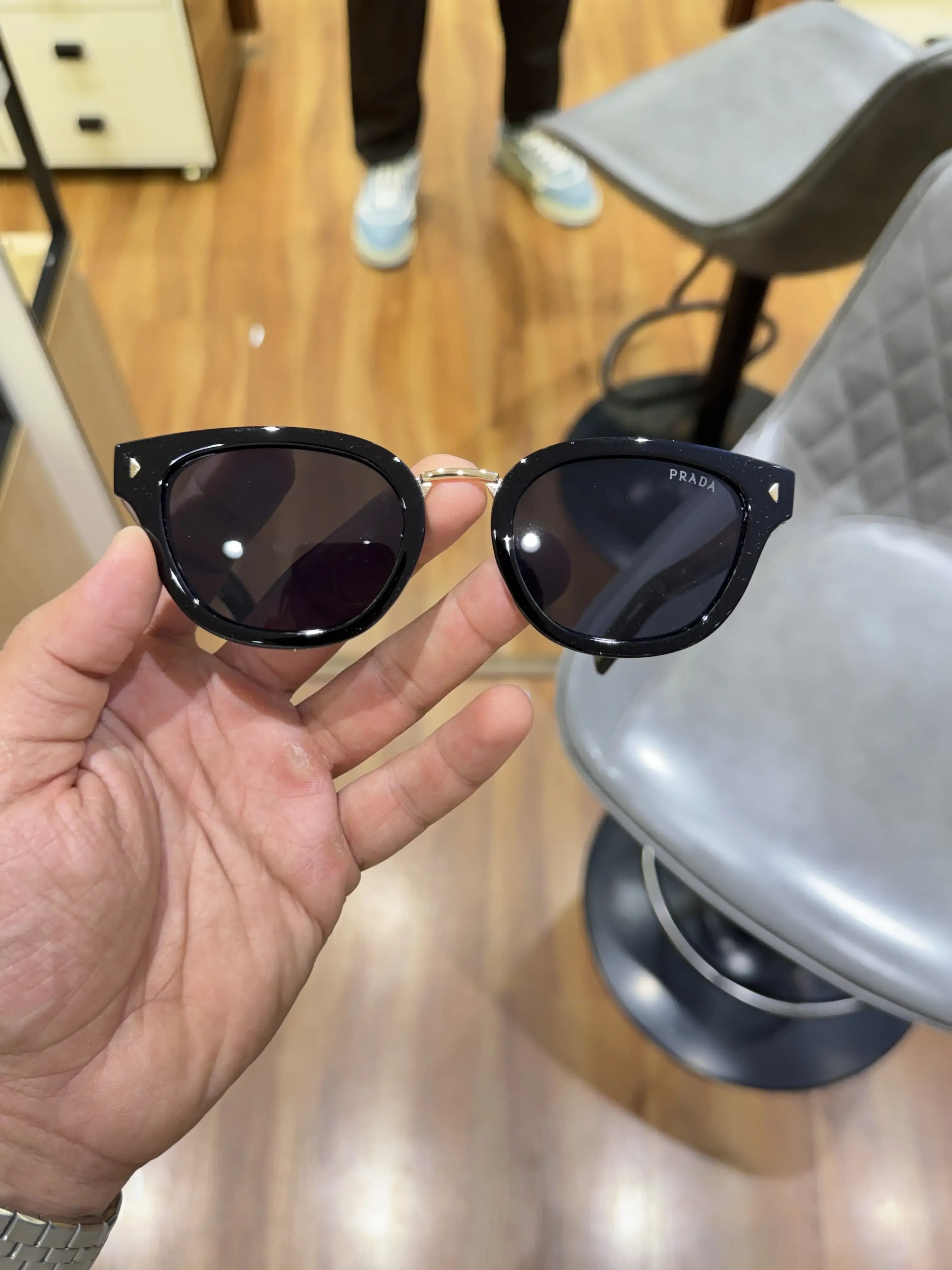 Prada Gold Black Sunglasses - Temple Logo View
