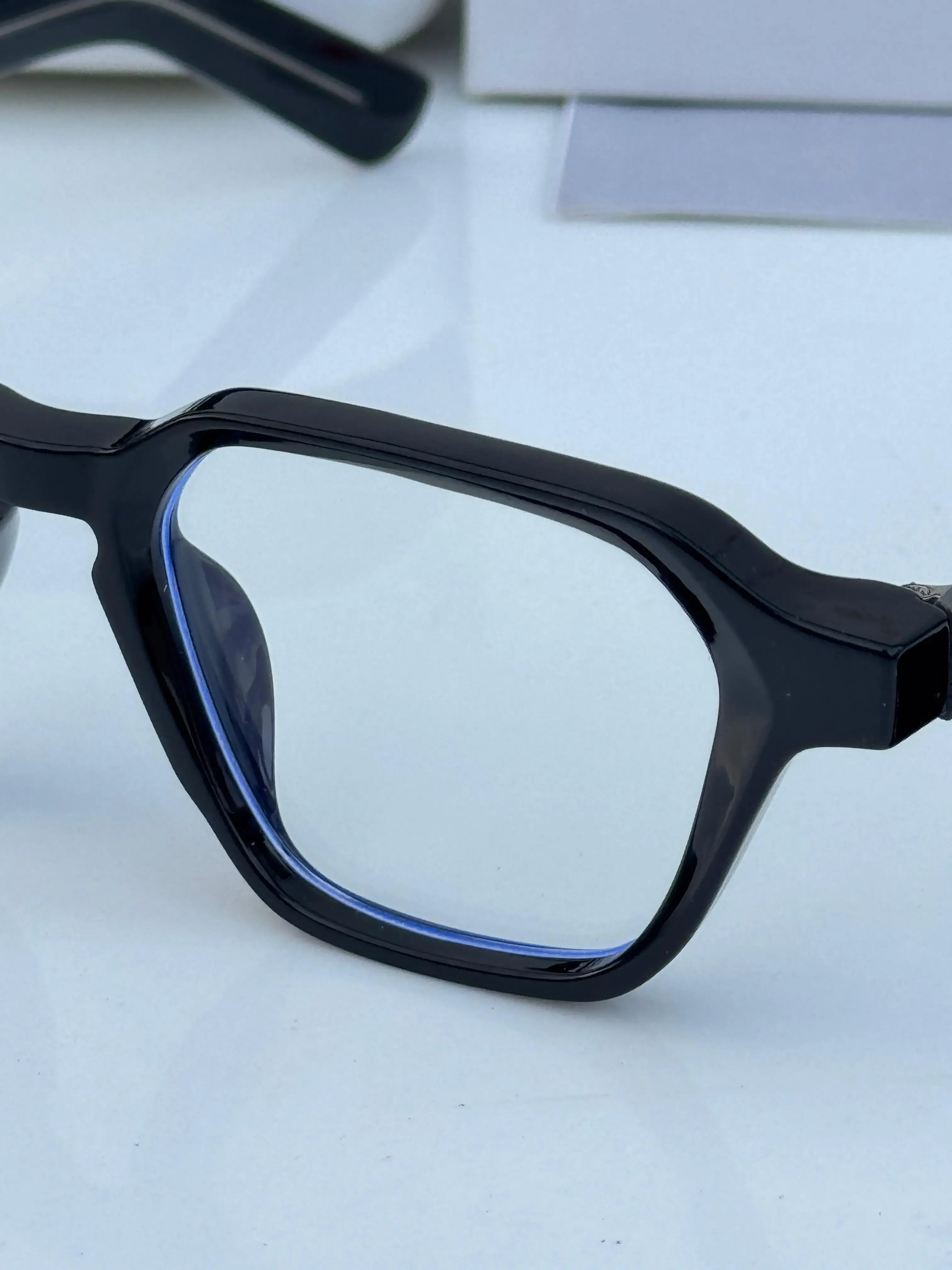 Ray-Ban RB1115 Black Plano - Front angled view showing geometric angular frame