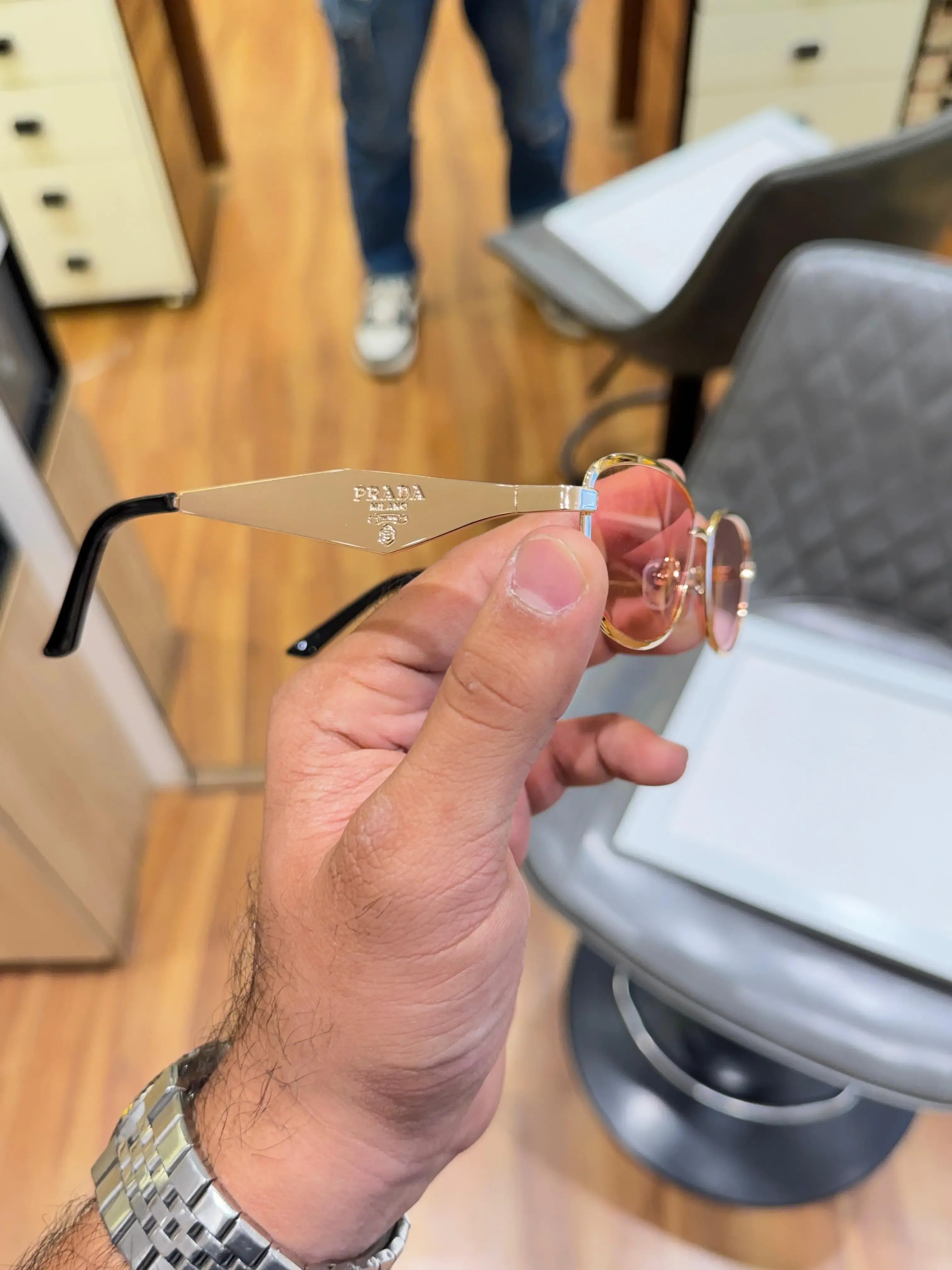 Prada Rose Gold Aviator Sunglasses - PRADA Milano Temple Engraving Detail