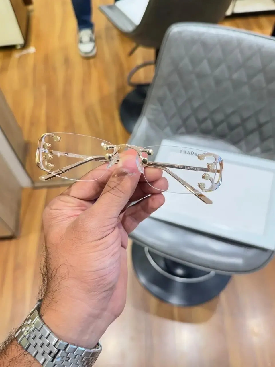 Prada Crystal Rimless Frame - Front View with Prada Case