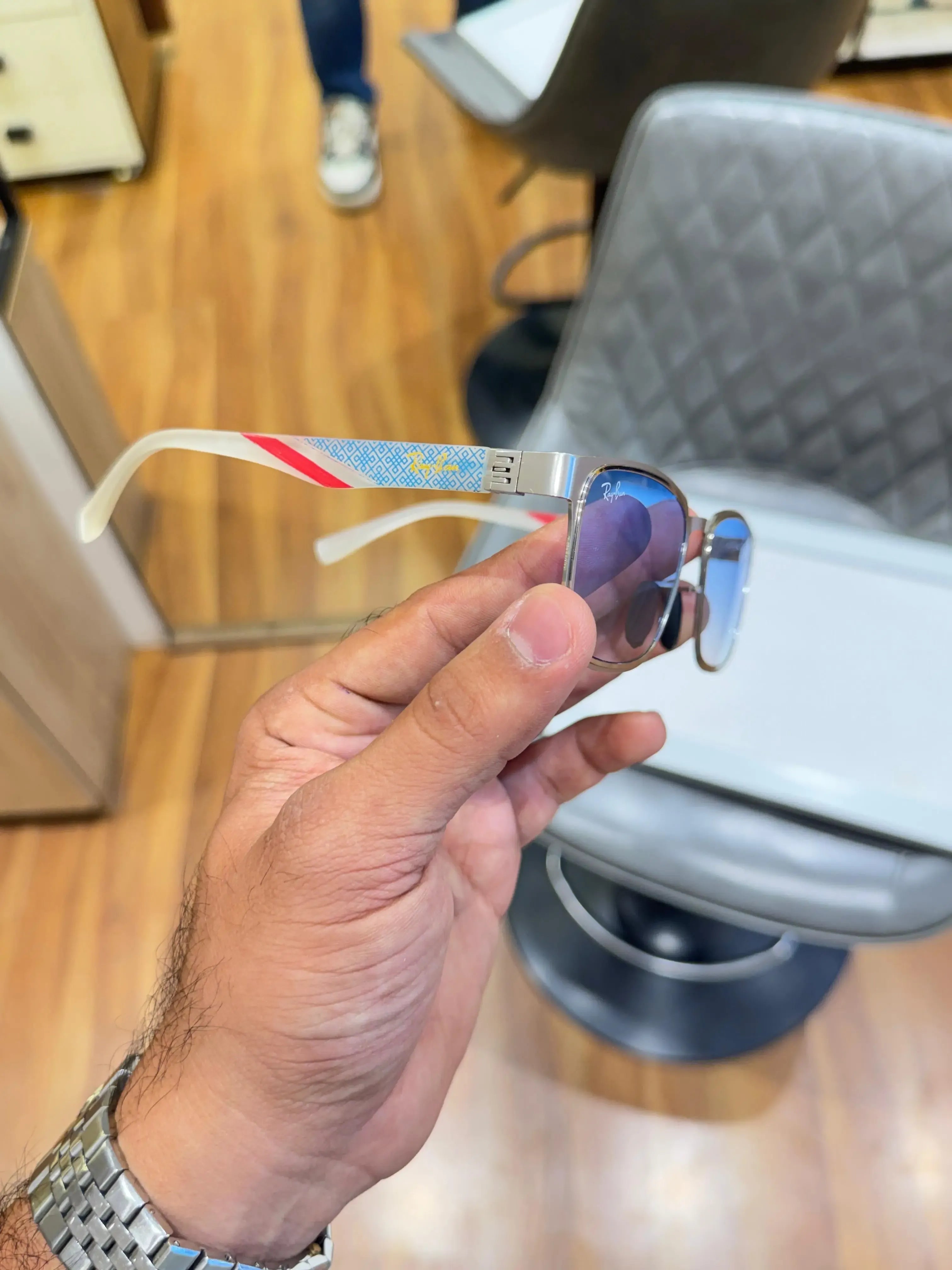 Ray-Ban RB2603 Sea Blue - Side temple view showing white geometric diamond-pattern arms with red stripe and yellow Ray-Ban branding