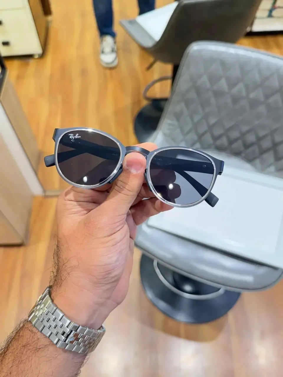 Ray-Ban RB2604 Black Silver - Front palm view showing gunmetal silver round frame and dark grey lenses