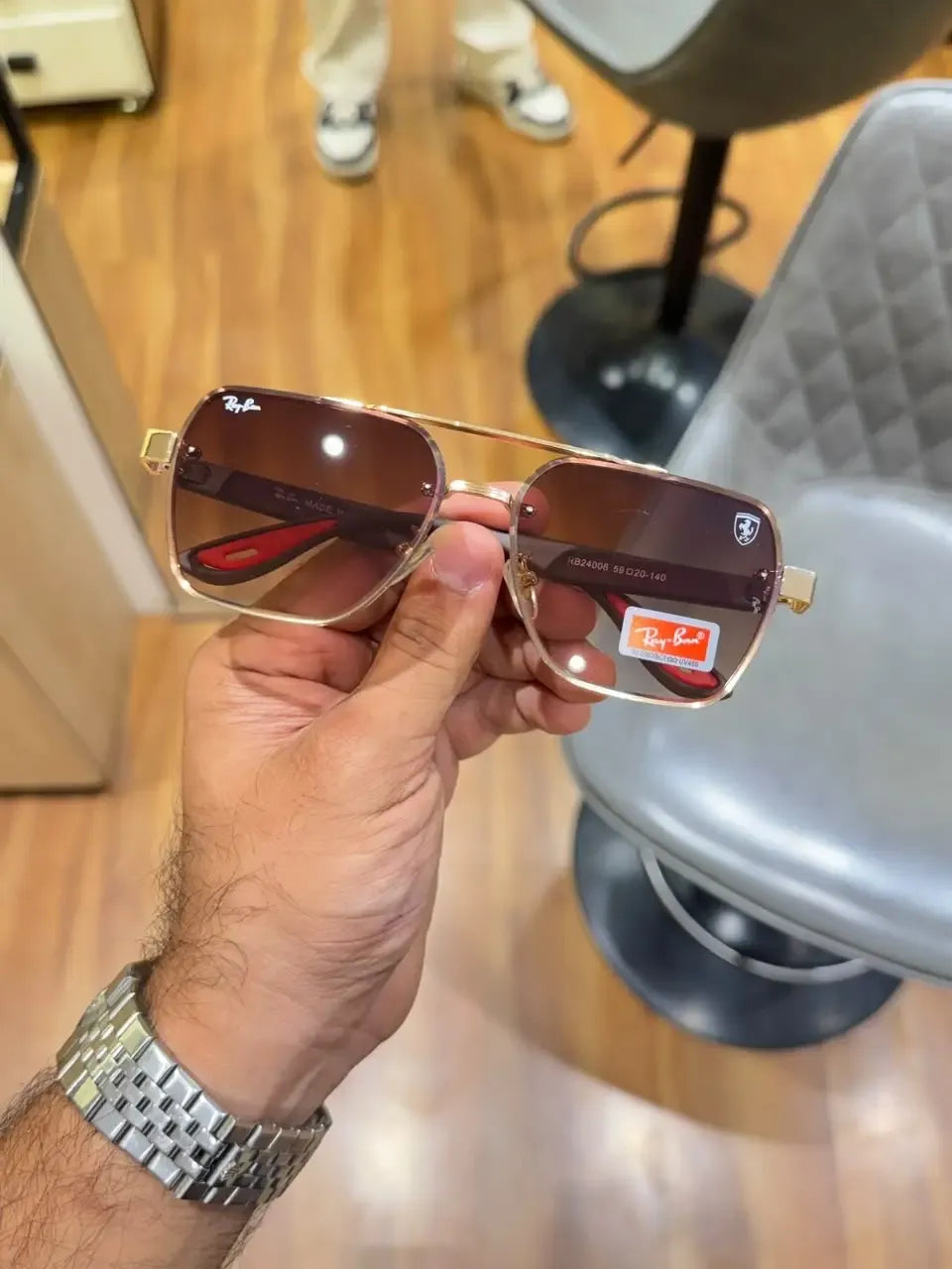 Ray-Ban x Ferrari RB4406M Gold Brown - Angled front view showing frame size 59-20-140