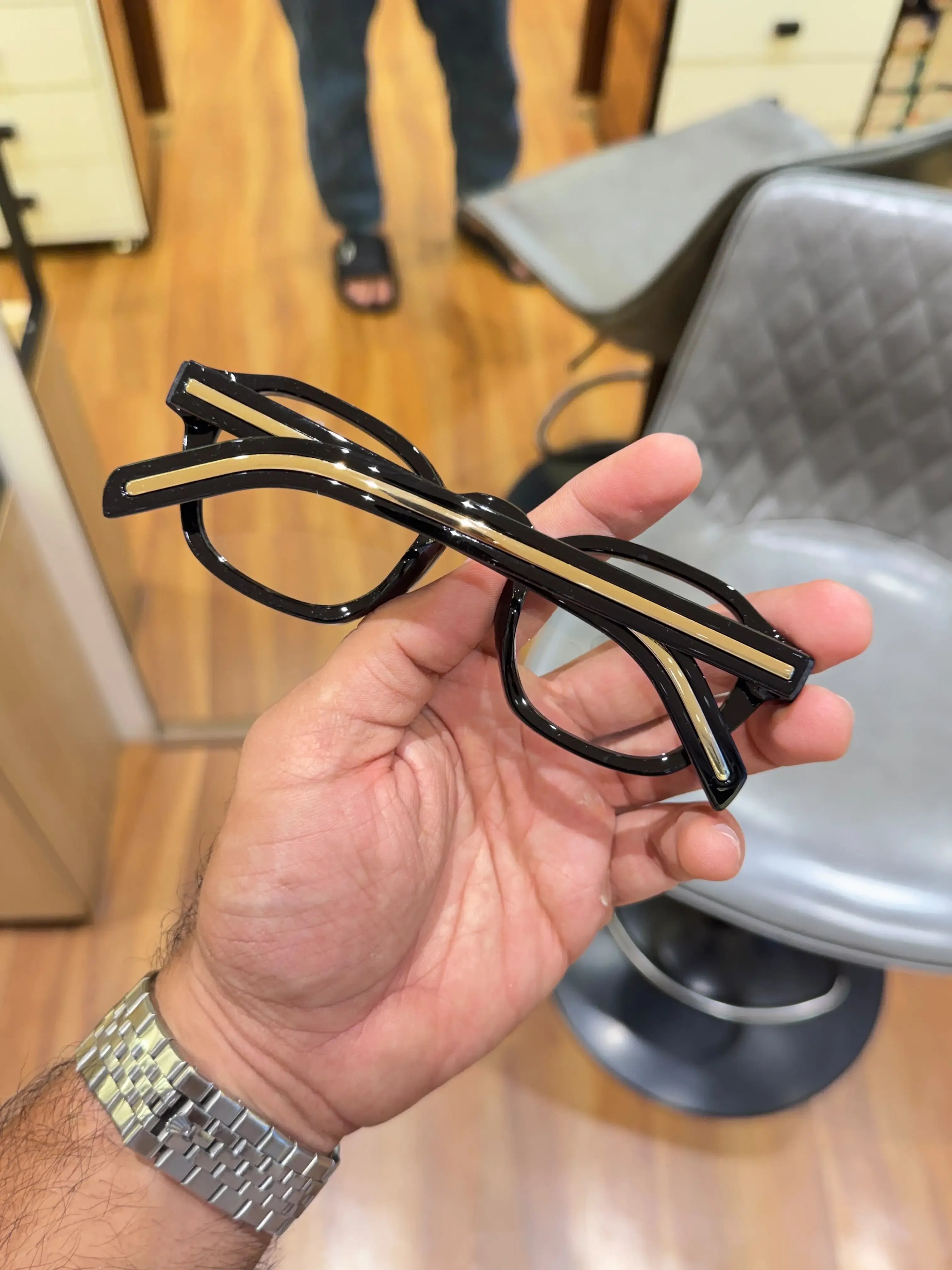 Prada Classic Black Gold Eyeglass Frame - Folded Gold Temple View