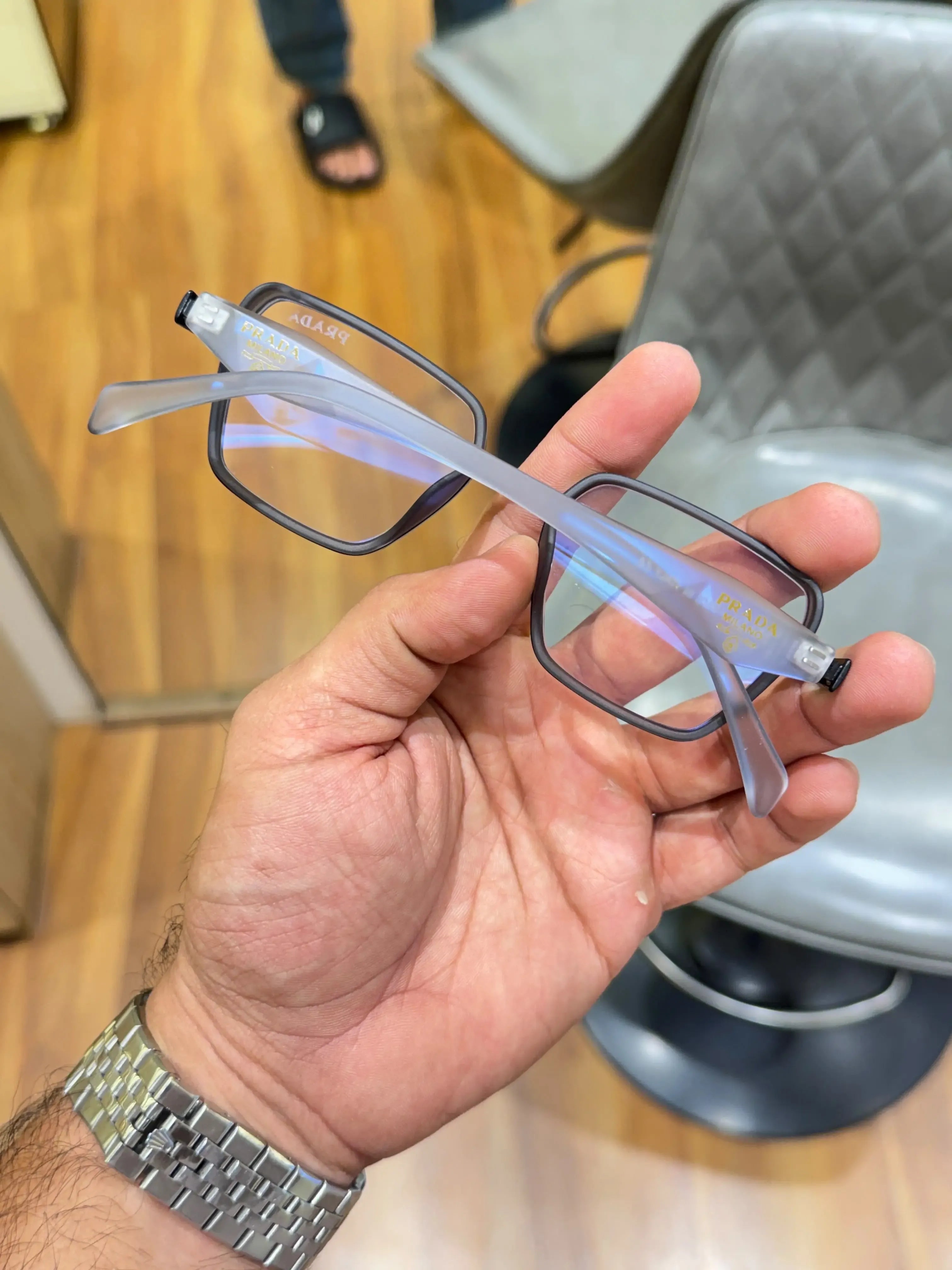 Prada Grey Square Eyeglass Frame - Folded View with Blue Cut Lens