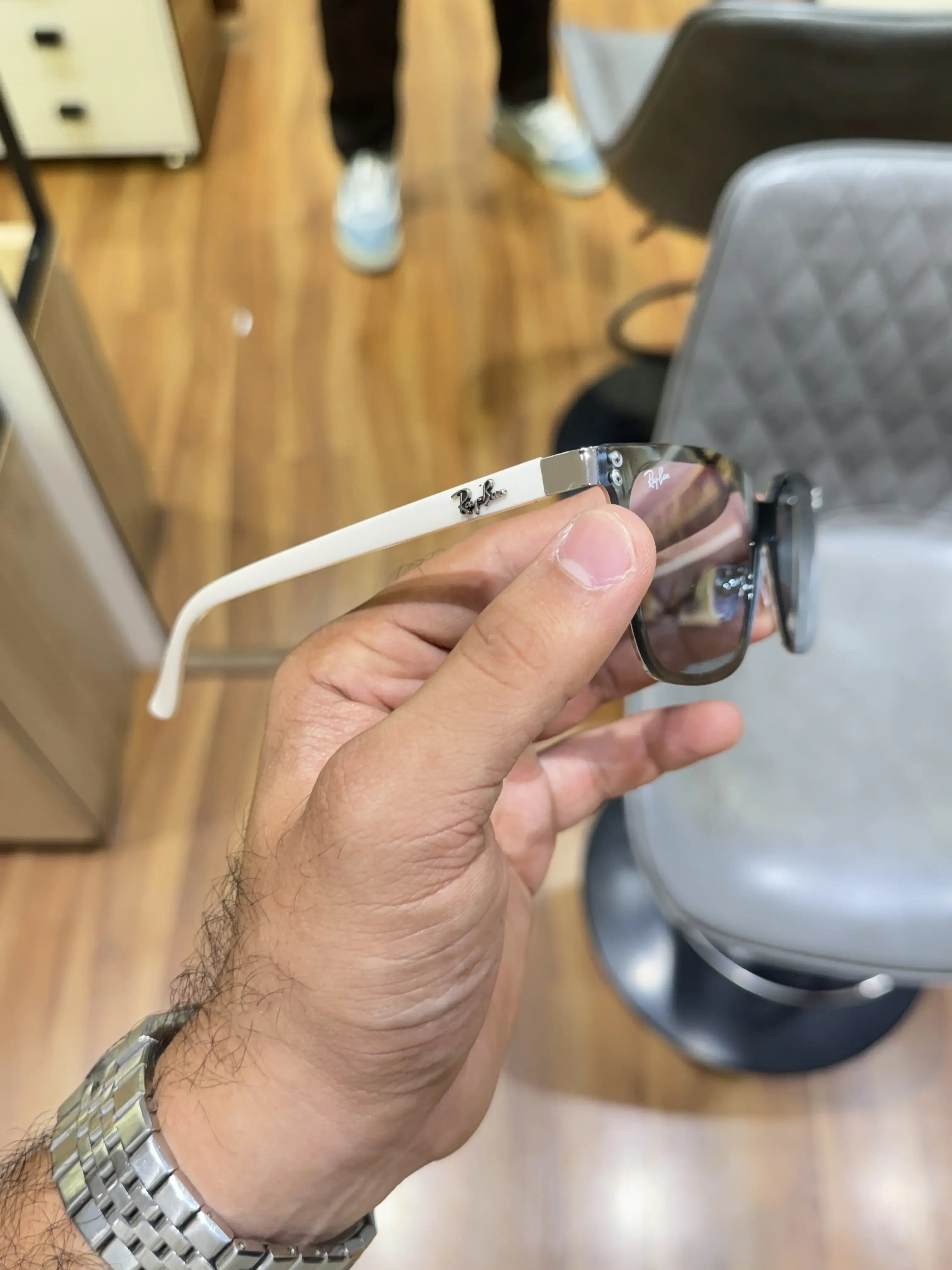 Ray-Ban RB2507S Grey White - Palm view showing grey gradient lenses and navy grey acetate front