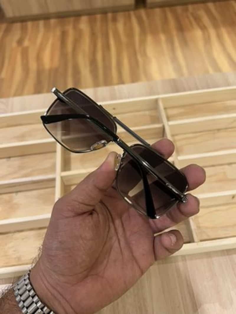 Gunmetal navigator sunglasses - side profile showing slim black temples