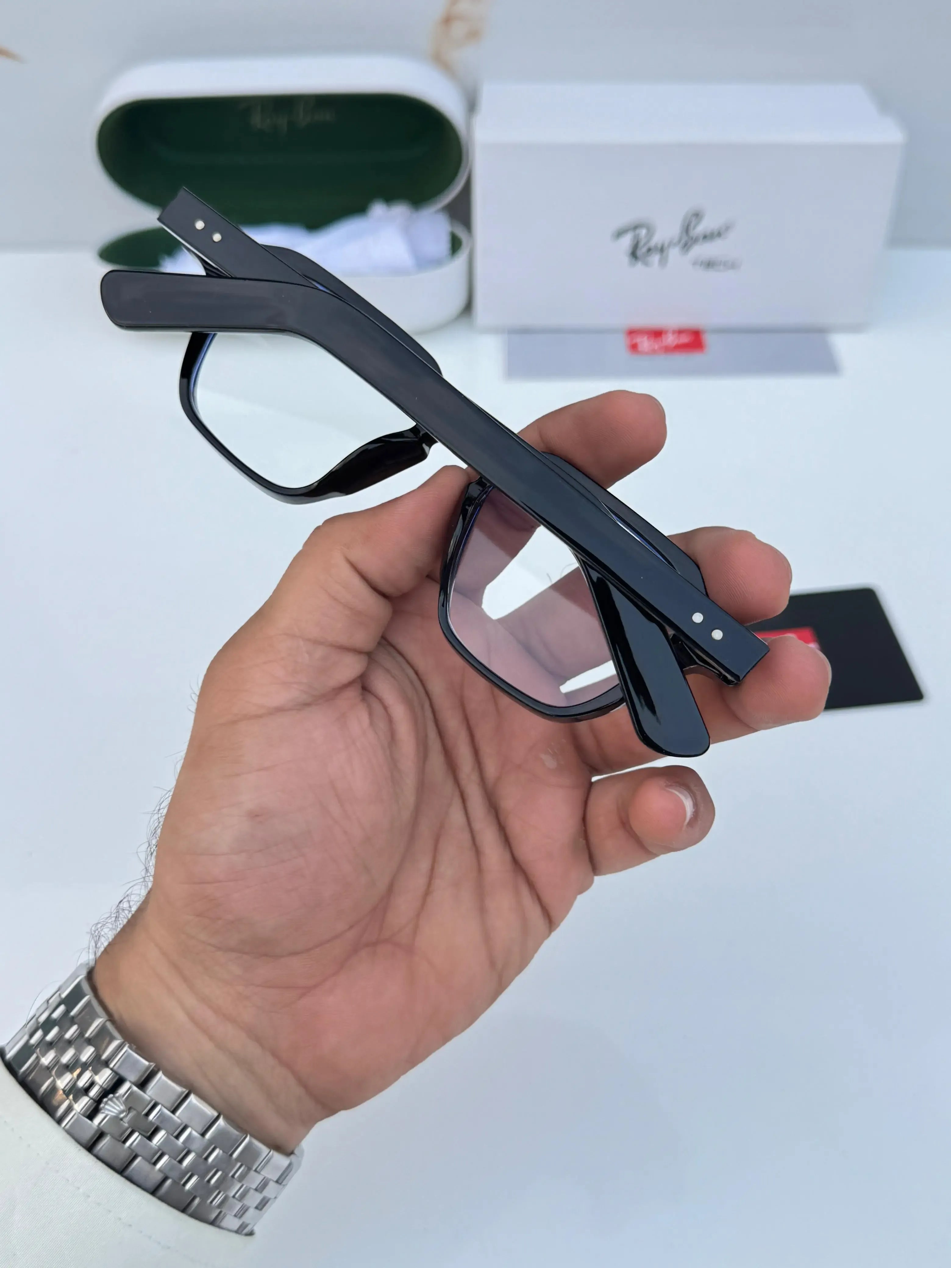 Ray-Ban RB1115 Black Plano - Close-up of lens showing blue-light coating and angular frame edge