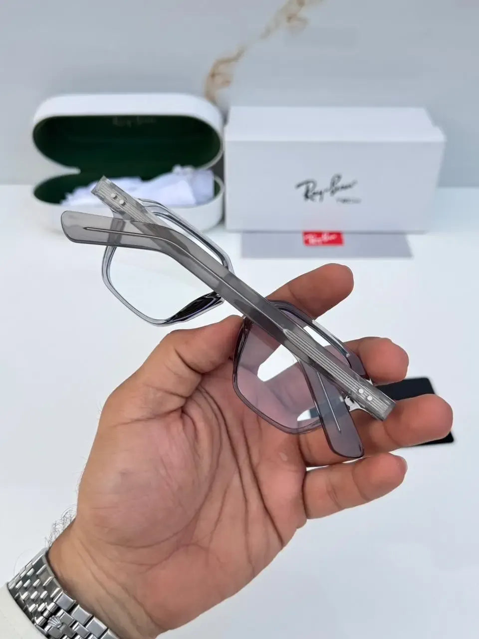 Ray-Ban 1115 Grey Plano - Folded hand hold view