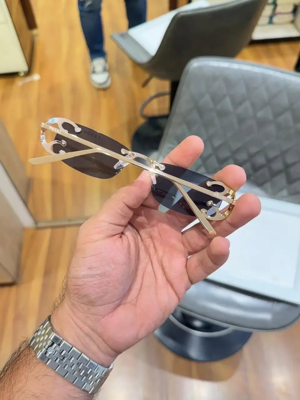 Prada Gold Black Rimless Sunglasses - Folded Side View