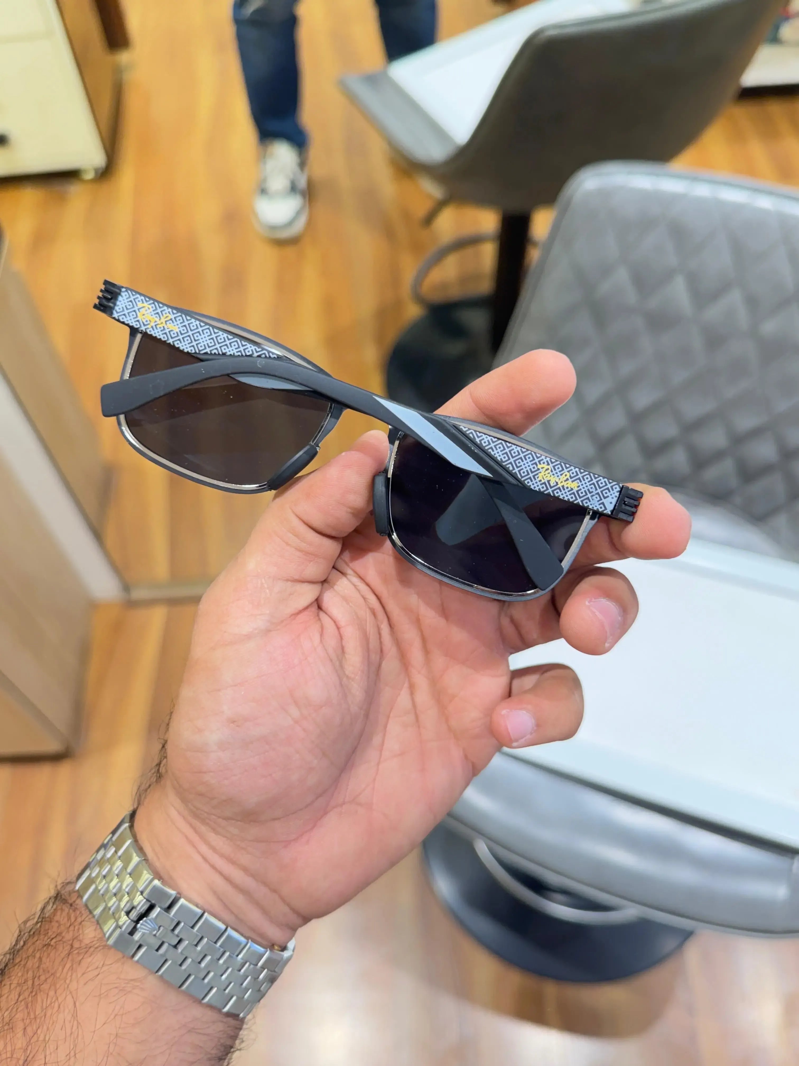 Ray-Ban RB2603 Black Silver - Side view showing geometric diamond-pattern temple arms with yellow Ray-Ban branding
