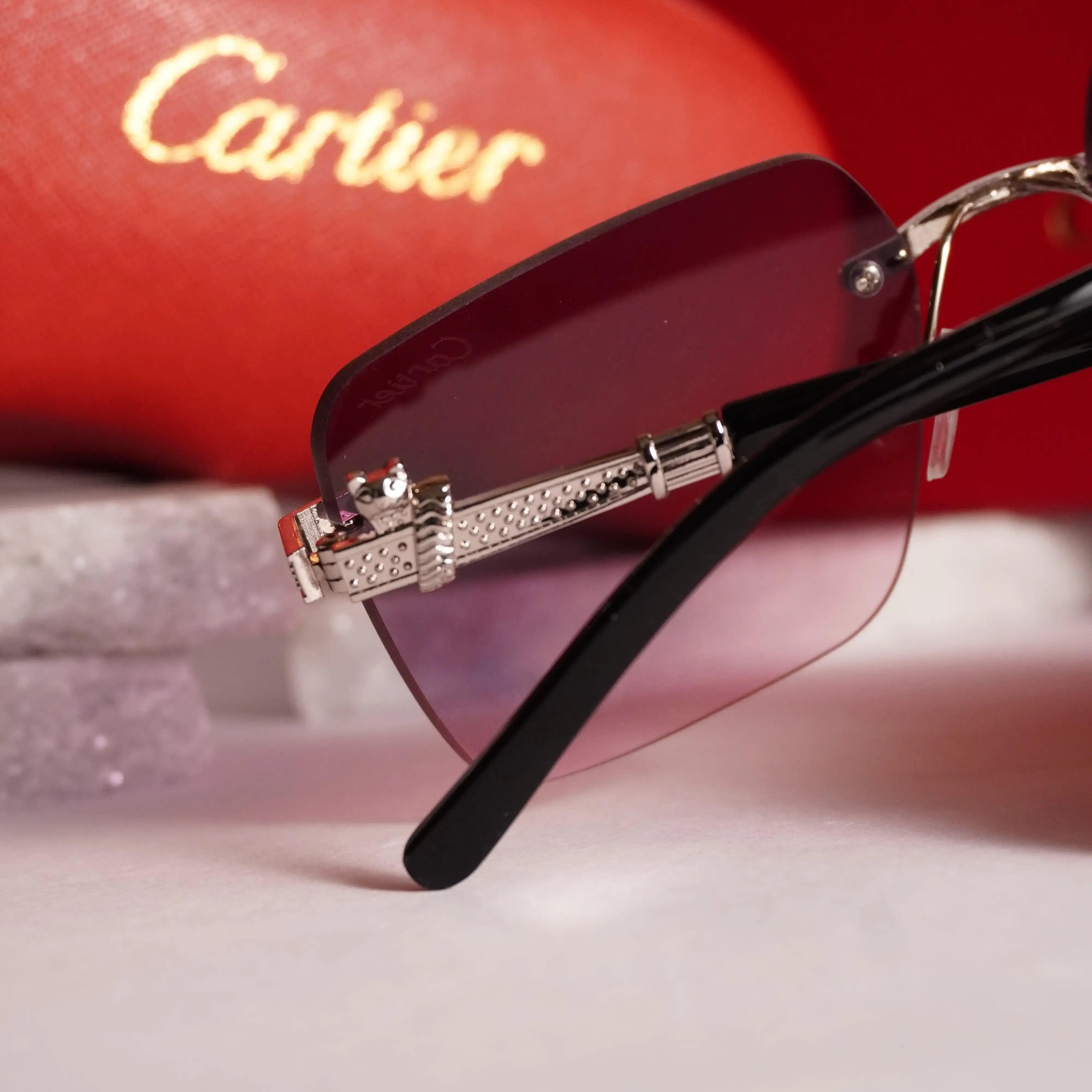 Violet gradient rimless square sunglasses - close up panther hinge detail