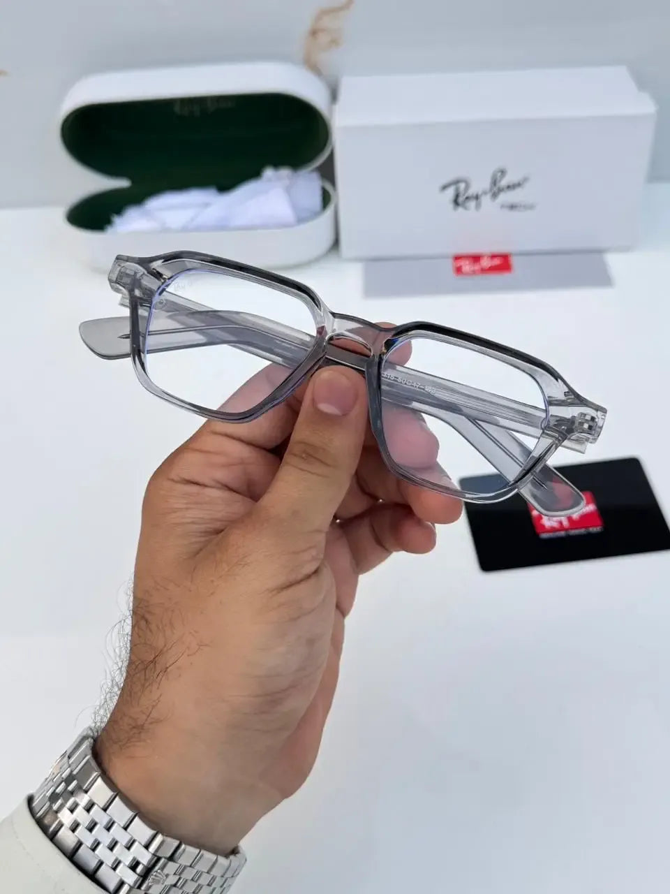 Ray-Ban 1115 Grey Plano - Front face hold view