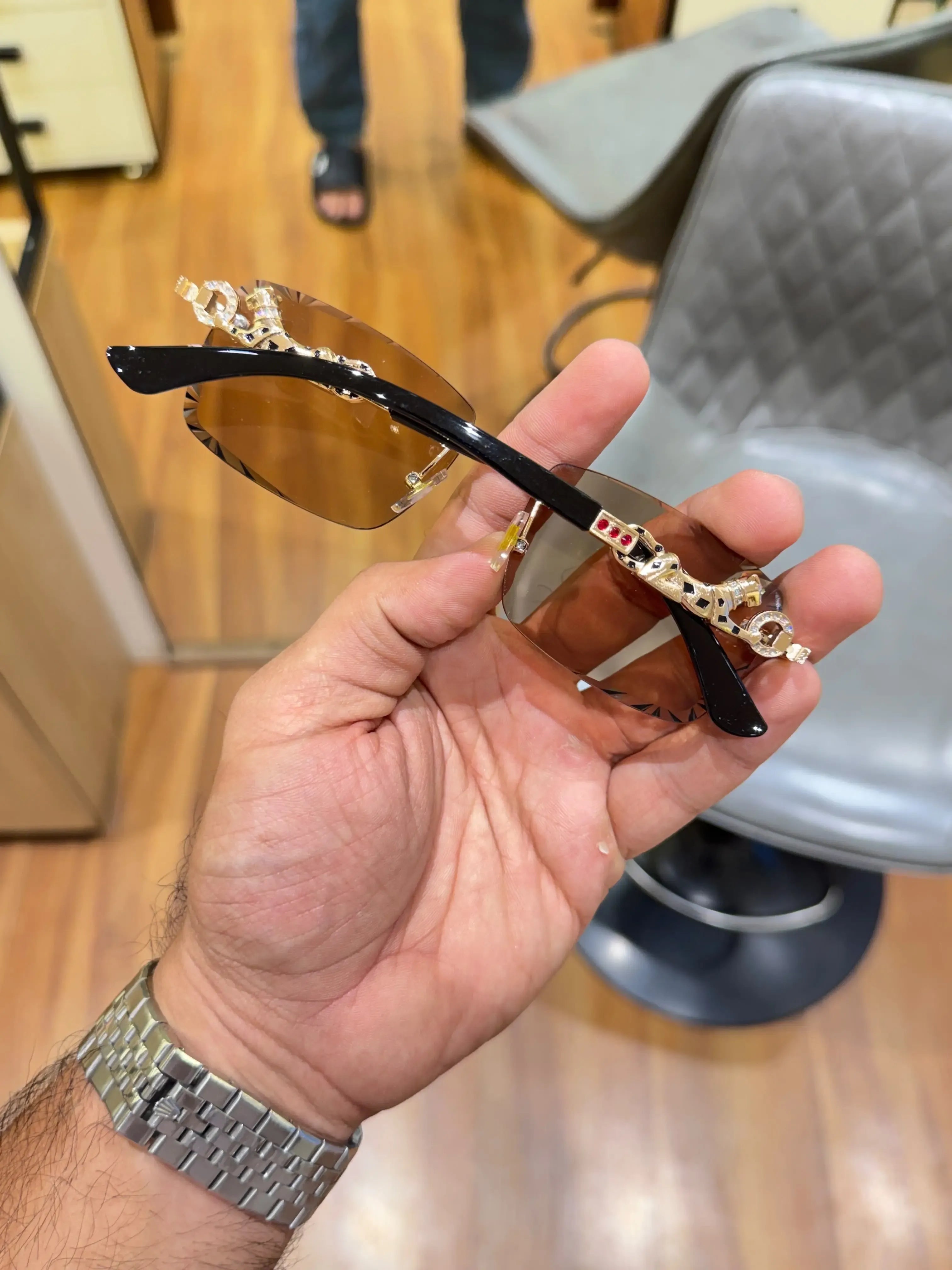 Amber rimless sunglasses - folded side view