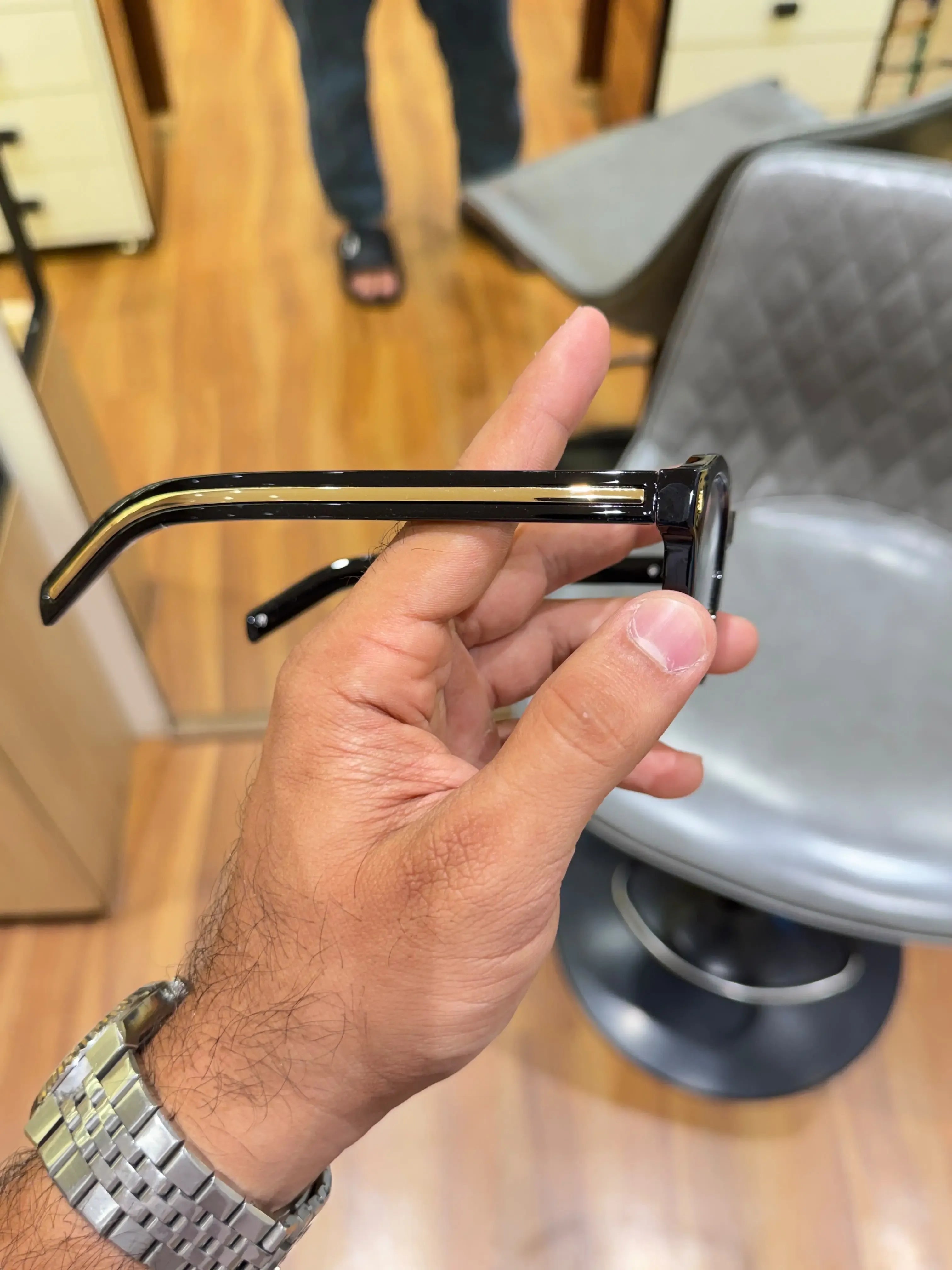 Prada Classic Black Gold Eyeglass Frame - Temple Side View