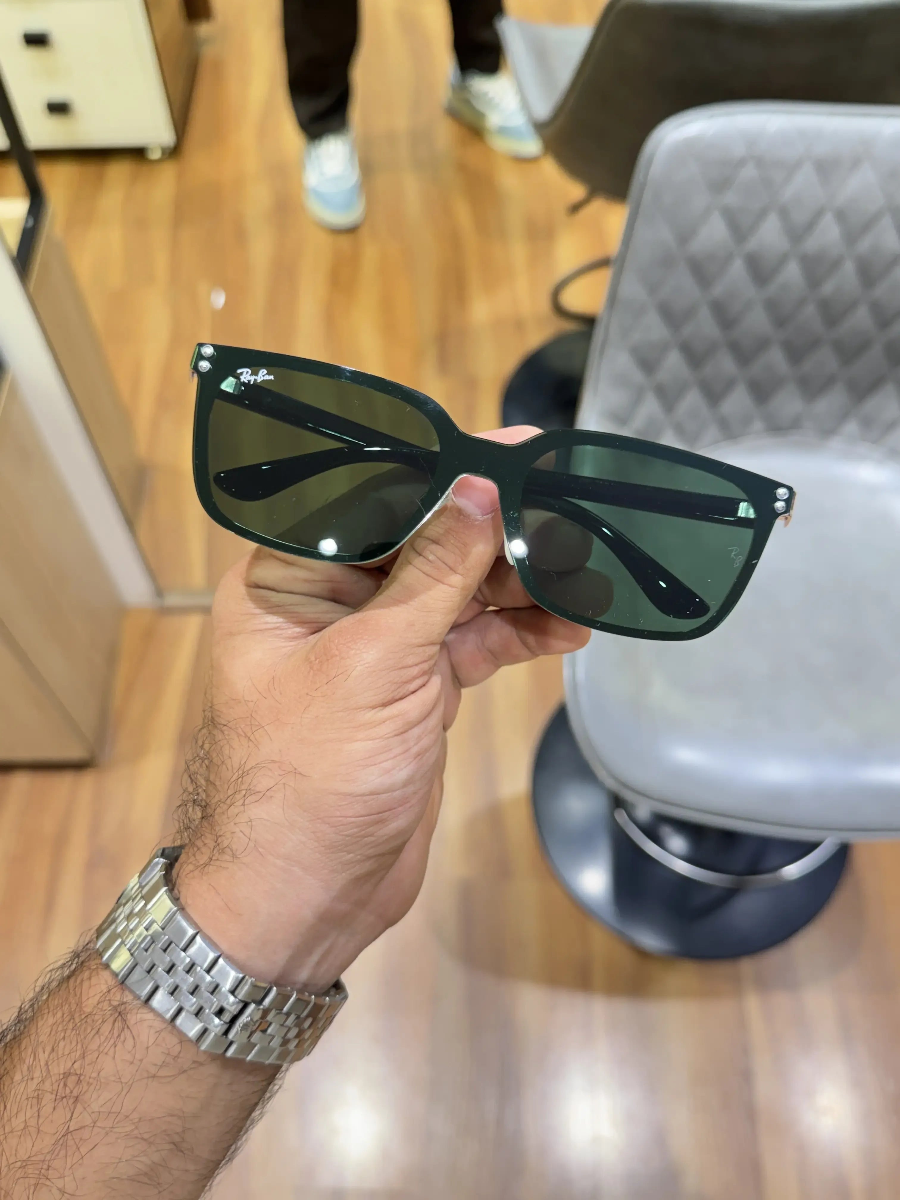 Ray-Ban RB2507S Black Green - Folded display showing gloss black acetate frame and green G-15 lenses with transparent nose pads