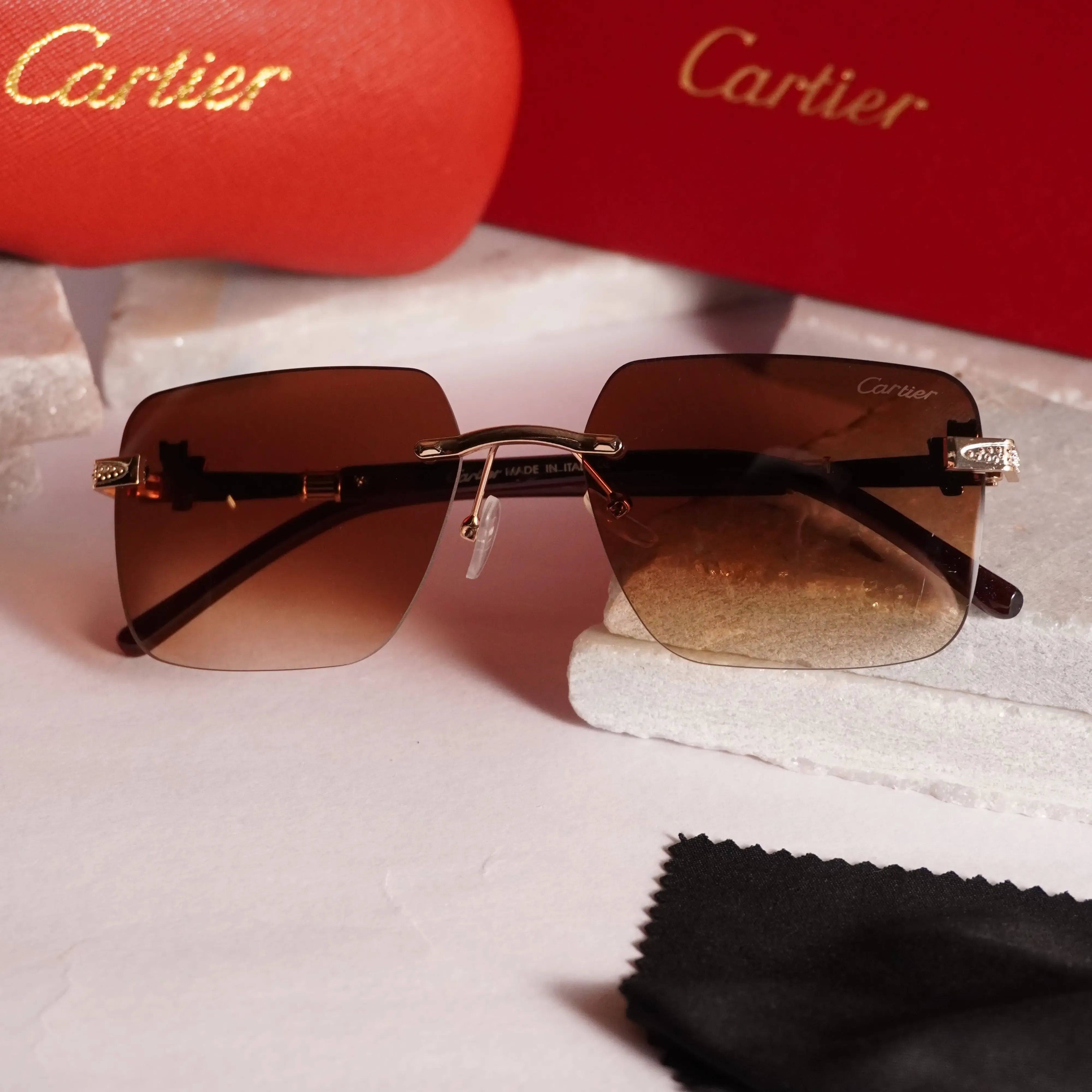 Rimless square gold brown gradient sunglasses - side view showing dark brown temples and hinge detail
